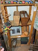 Full view of wooden shelving unit with four slatted shelves, contents present but not included