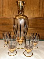 Decanter with five matching glasses