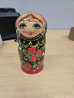 Largest closed nesting doll, frontal view of painted detail