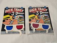 Front covers of both Dick Tracy in 3-D comics with glasses visible
