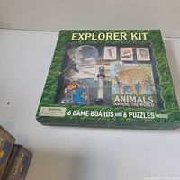 Front of boxed Explorer Kit showing contents through window