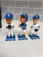 Group shot of three Blue Jays bobbleheads: Romero, Escobar, Morrow