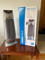 Heater standing next to original box