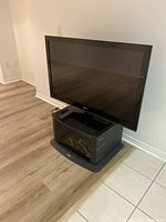 Front view of LG TV on stand