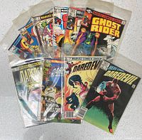 Fanned view of ten Marvel comics, most in plastic sleeves