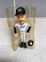 Bobblehead figure front view in blister plastic with glove accessory
