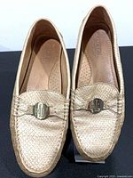 Top view of both loafers showing gold leather, RL hardware, and condition
