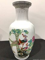 Full view of porcelain vase showing shape and decoration