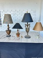Group shot of all four vintage table lamps with shades