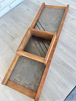 Full view of kraut cutter board with sliding box and blades