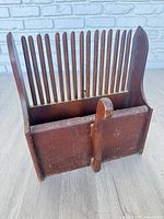 Front view showing tines and box