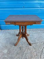 Full view of wooden pedestal side table