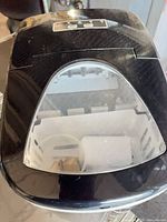 Top view showing window lid and interior basket