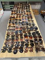 Full table view of mixed eyeglasses and sunglasses