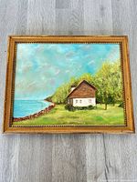 Framed oil painting front view showing full artwork