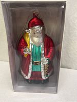 Front view of mercury glass Santa ornament in clear display box