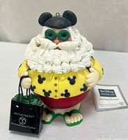 Full view of Santa ornament with tag visible