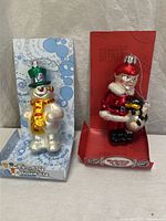 Both boxed mercury glass ornaments side by side