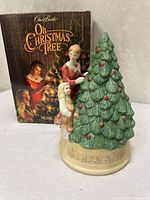 Full figurine and box showing scale and design