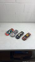 Group shot of four NASCAR Monte Carlo die-cast models