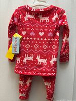 Front view of pajama set on hanger showing pattern and new tag