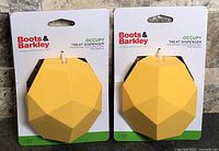 Front view of two packaged Boots & Barkley Occupy Treat Dispensers
