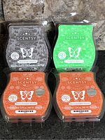 Front view of all four sealed Scentsy wax melt bars