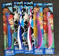 Front view of five sealed Oral-B Disney Princess toothbrushes