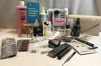 overview of all packaged personal care and beauty items on table