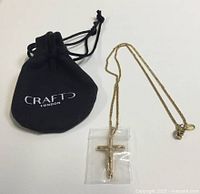 Necklace, crucifix pendant, Craftd London pouch