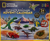 Front of National Geographic Ultimate Dinosaur Advent Calendar box showing dinosaurs and activity count