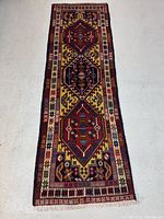 Full view of handmade Persian runner rug