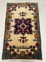 Full view of handmade Persian Tabriz wool rug
