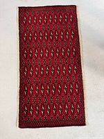 Full view of Turkman wool rug showing overall design and size proportion