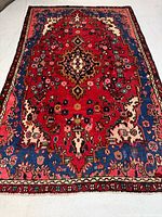 Full view of entire Persian Hamadan rug showing size, colors and pattern