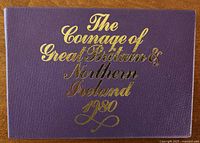 Front of purple folder with gilt lettering
