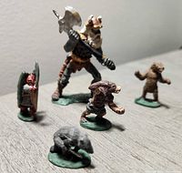 Front view of all five painted miniatures