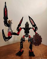 Front view of assembled Skrall figure holding shield and launcher