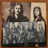 Front album jacket showing band photo and title