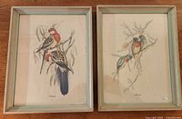 Front view of both framed lithographs
