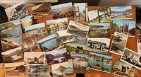 Spread of colour and black-and-white vintage postcards showing various scenic views