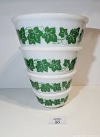 All four Hazel Atlas ivy bowls stacked to show graduated sizes and pattern