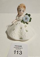 Front view of Josef Originals December birthstone figurine