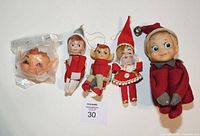 All five pixie elf items lined up for scale with MaxSold lot card