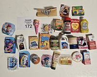 Full lot overview showing all miniature items arranged around lot tag 172