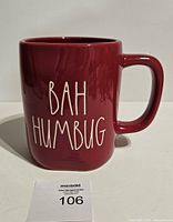 Front view of red Rae Dunn mug with "BAH HUMBUG" text