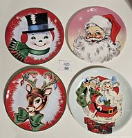 Group shot of all four illustrated plates