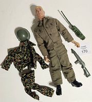 GI Joe figure with accessories laid out