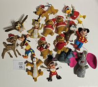 Group shot of all 17 flocked Disney ornaments