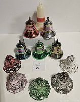 Group shot showing candle, metallic bells and lattice bells